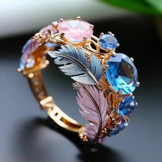 VINTAGE FEATHER CRYSTAL RING