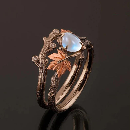 GRANNY'S JEWEL - Nature-inspired moonstone ring with vintage silver band, adjustable boho jewelry design, glowing crystal gemstone for women.