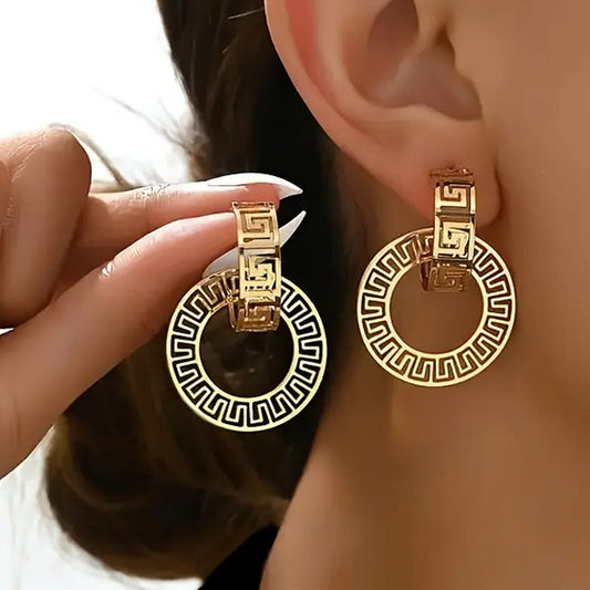 "Pair of vintage hollow geometry earrings in minimalist statement design, lightweight fashion jewelry for women, perfect for casual and elegant outfits."