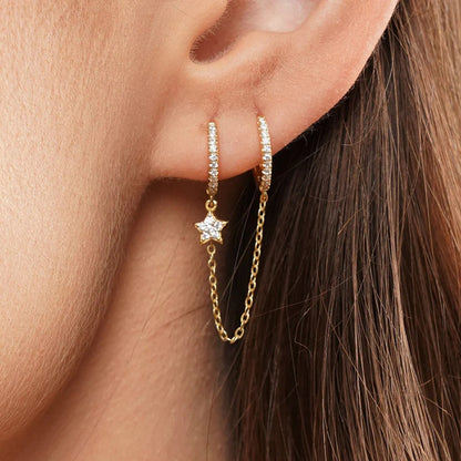 "Trendy double hoop chain earrings in gold, modern statement jewelry for women — lightweight and stylish accessory for casual or formal outfits."