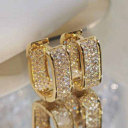 "Pair of vintage bright earrings with sparkling zirconia stones, elegant retro jewelry perfect for women’s special occasions and gifts."