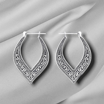 VINTAGE ETHNIC CARVED HEART EARRINGS