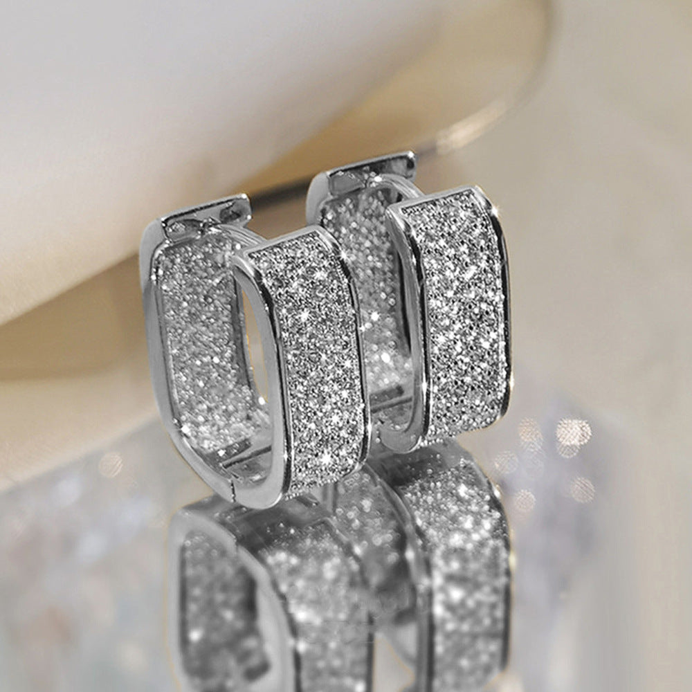 "Pair of vintage bright earrings with sparkling zirconia stones, elegant retro jewelry perfect for women’s special occasions and gifts."